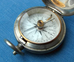 Small pocket compass in pouch