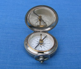 Small pocket compass in original cotton pouch