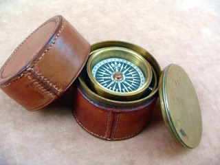 Victorian leather clad gimbaled boat compass by Dollond London