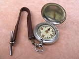 Vintage hunter cased pocket compass with leather strap & T bar