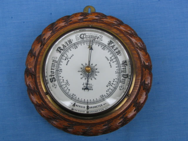 Oak rope twist barometer by J Hall Opticians, Bradford