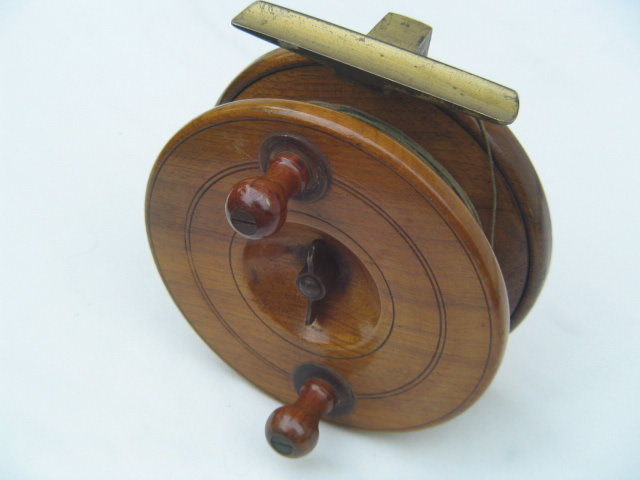 Early walnut salmon or sea fishing reel