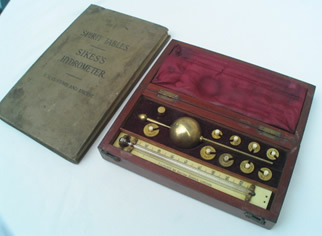 Sikes hydrometer by TO Blake + book of spirit tables
