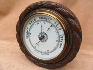 Vintage rope twist style aneroid barometer