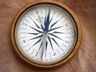 F Barker mahogany cased desk top compass