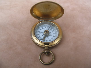 Gilded brass pocket compass