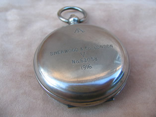 View of compass underside with makers marks
