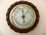 Antique barometer with curved thermometer circa 1885
