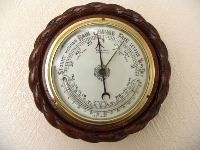 Victorian aneroid barometer with curved thermometer