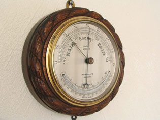 Ships marine barometer with thermometer