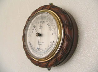 Ships marine aneroid barometer with curved thermometer