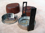 Vintage leather cased pocket compass with integral sight vanes