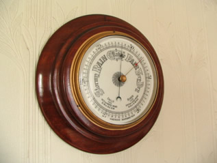 Vintage mahogany cased aneroid barometer