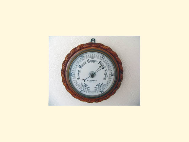Oak rope twist aneroid barometer by G F Brown & Co Carlisle