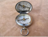 Antique hunter cased pocket compass with cross bar needle