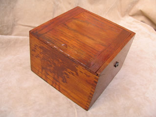Top view of compass with lid closed showing stain on front 