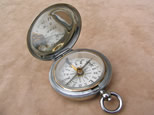 Full hunter cased needle pocket compass in a Dennison case