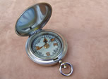 Military style hunter cased pocket compass in a Dennison case