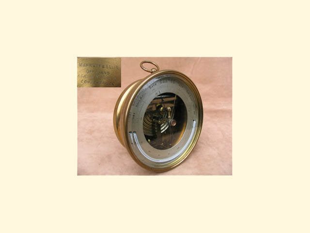 19th century brass aneroid barometer with curved thermometer 