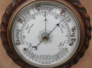Oak framed aneroid barometer with ceramic dial