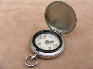 Pocket watch style hunter cased compass