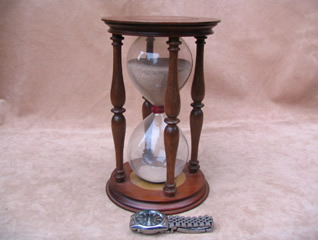 Edwardian hourglass with wristwatch for scale only
