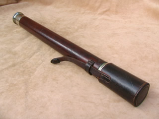 Early 20th century Naval single draw telescope by Hughes & Son, with protective leather end cap