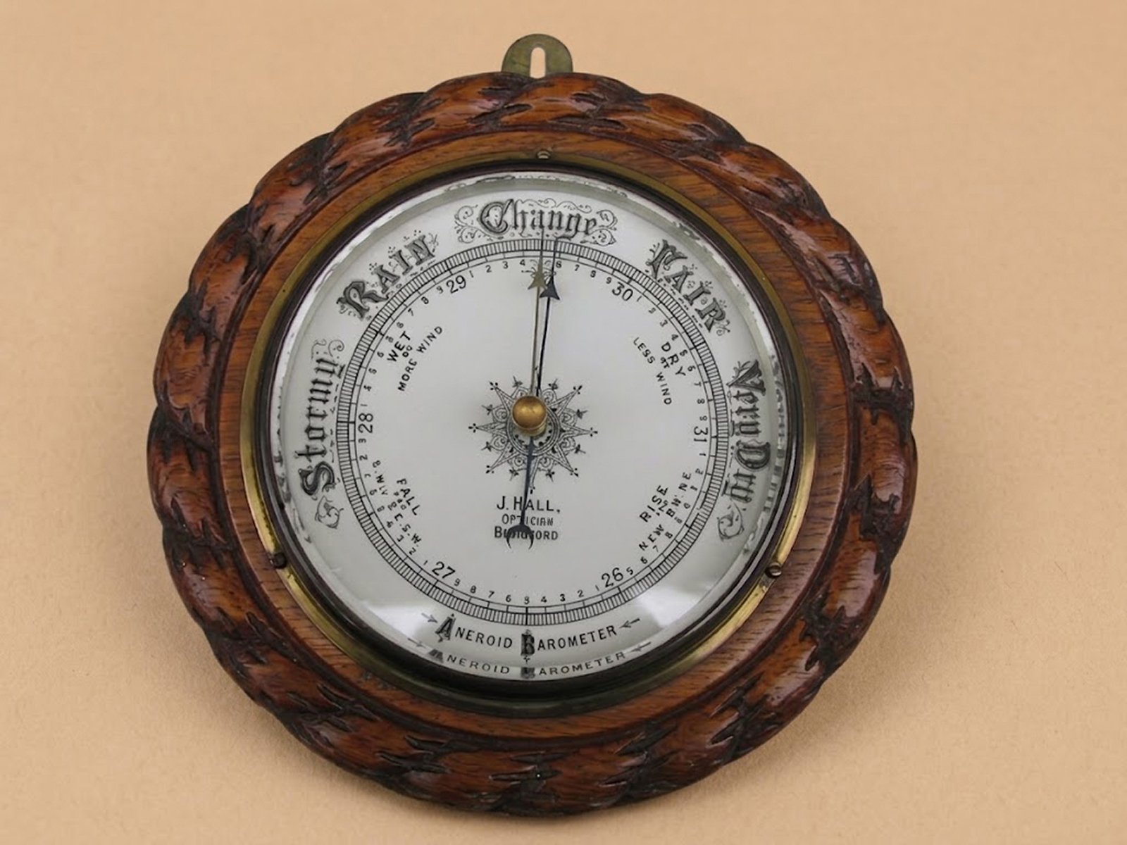 Oak aneroid barometer by J Hall Opticians, Bradford