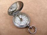 Tycos brass cased pocket compass with floating dial, by Short & Mason