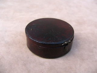 Top view with lid fastened by brass hook