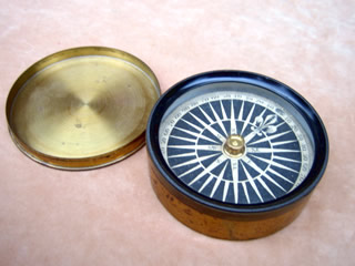 19th century explorers compass with push on lid