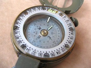 Close up view of compass mother of pearl dial