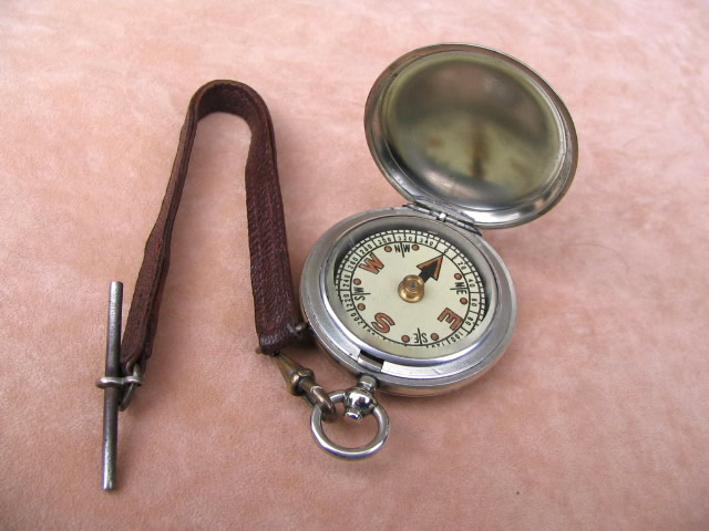 Full hunter cased pocket compass with leather strap & T bar
