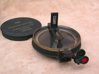 Prismatic surveying compass