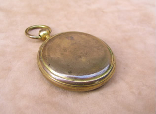 Reverse view of Georgian brass compass