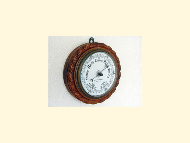 19th century aneroid barometer in Oak surround