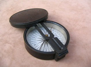 view of compass with sight vanes folded